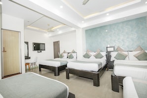 Premium bedding, down comforters, pillowtop beds, in-room safe