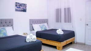 Family Room | Minibar, in-room safe, individually furnished, iron/ironing board - Hotel Capriccio Mare y Restaurante (Punta Cana)