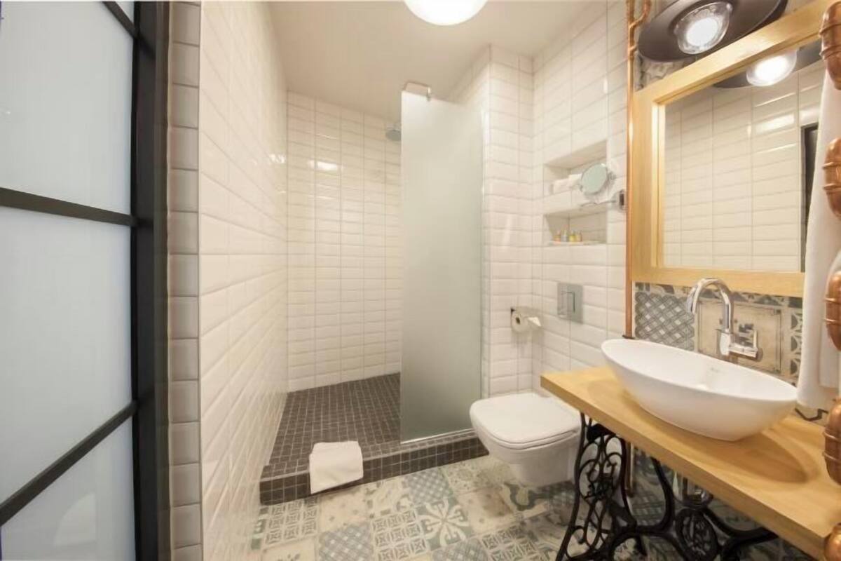 Bathroom | Shower, rainfall showerhead, free toiletries, hair dryer