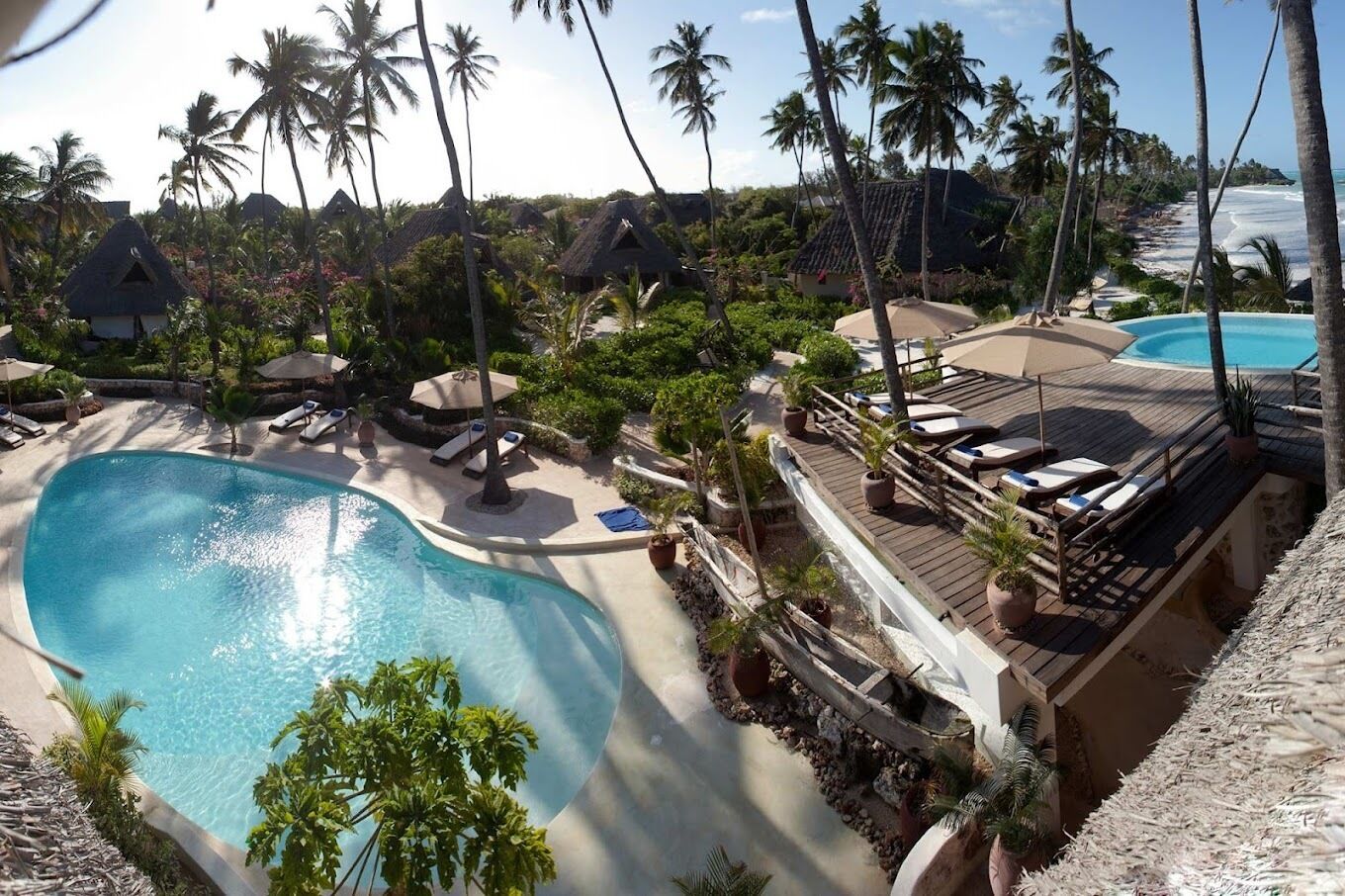 3 outdoor pools, pool umbrellas, pool loungers