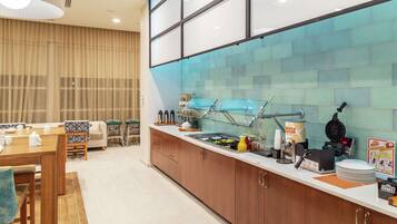 Daily buffet breakfast (USD 15.00 per person)