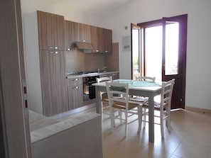 Standard Condo, 2 Bedrooms | Private kitchen - Oasi Guzzetta Hotel e Case Vacanze (Marsala)