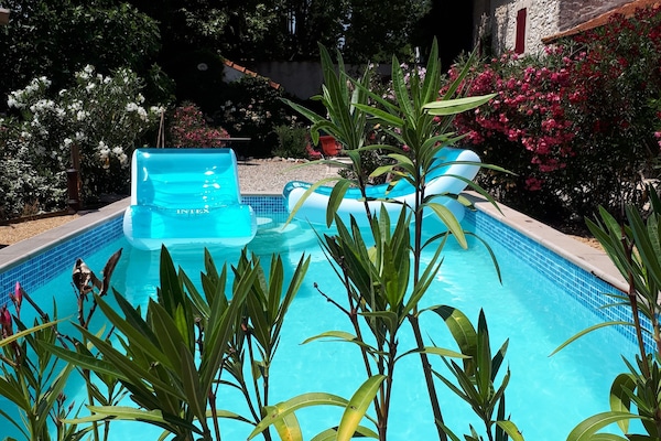 Outdoor pool, pool umbrellas, pool loungers