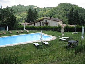 Outdoor pool, pool umbrellas, pool loungers