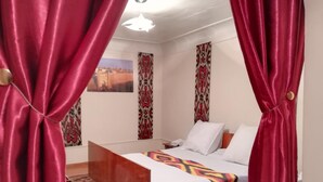 Desk, iron/ironing board (on request), rollaway beds (surcharge) - Umarxon Hostel (Bukhara)