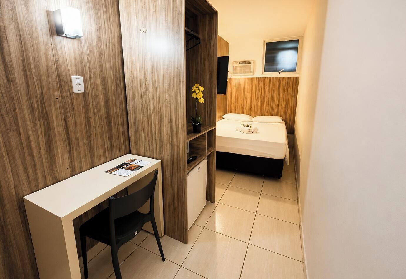 Economy Double Room, 1 Double Bed | Minibar, in-room safe, desk, laptop workspace