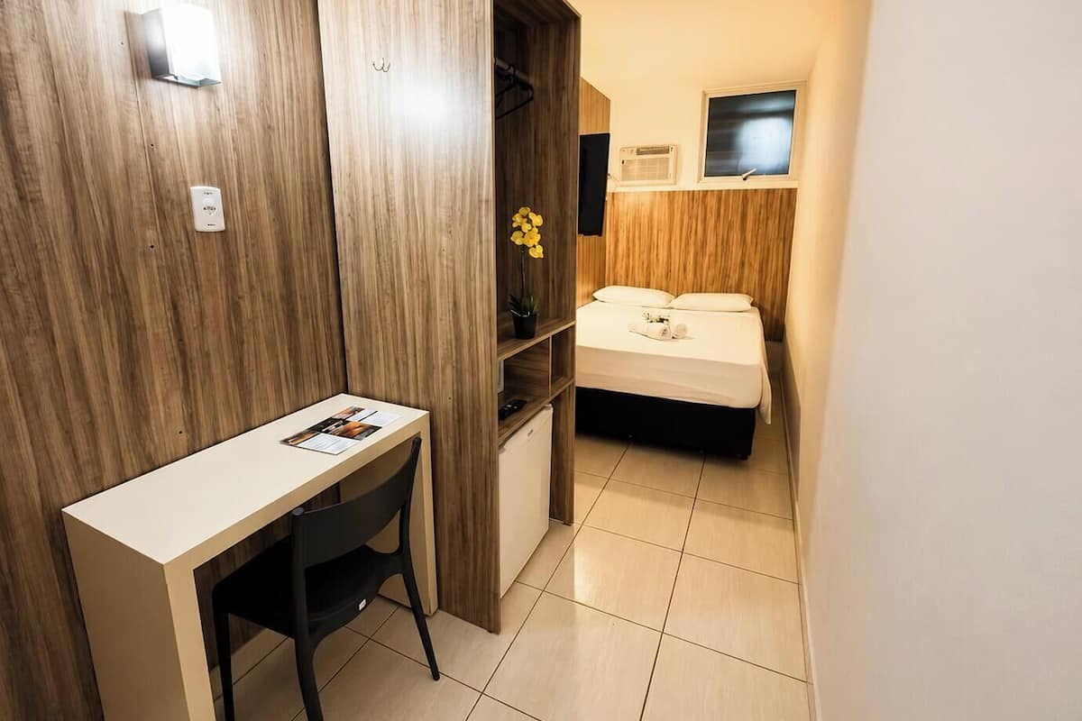 Economy Double Room, 1 Double Bed | Minibar, in-room safe, desk, laptop workspace
