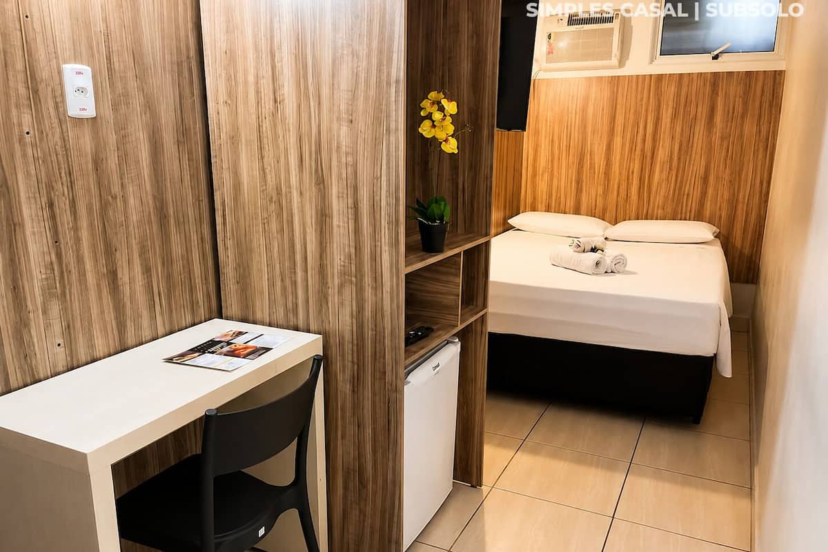 Economy Double Room, 1 Double Bed | Minibar, in-room safe, desk, laptop workspace