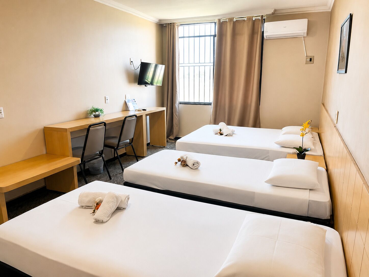Deluxe Quadruple Room, 1 Bedroom, Accessible | Minibar, in-room safe, desk, laptop workspace