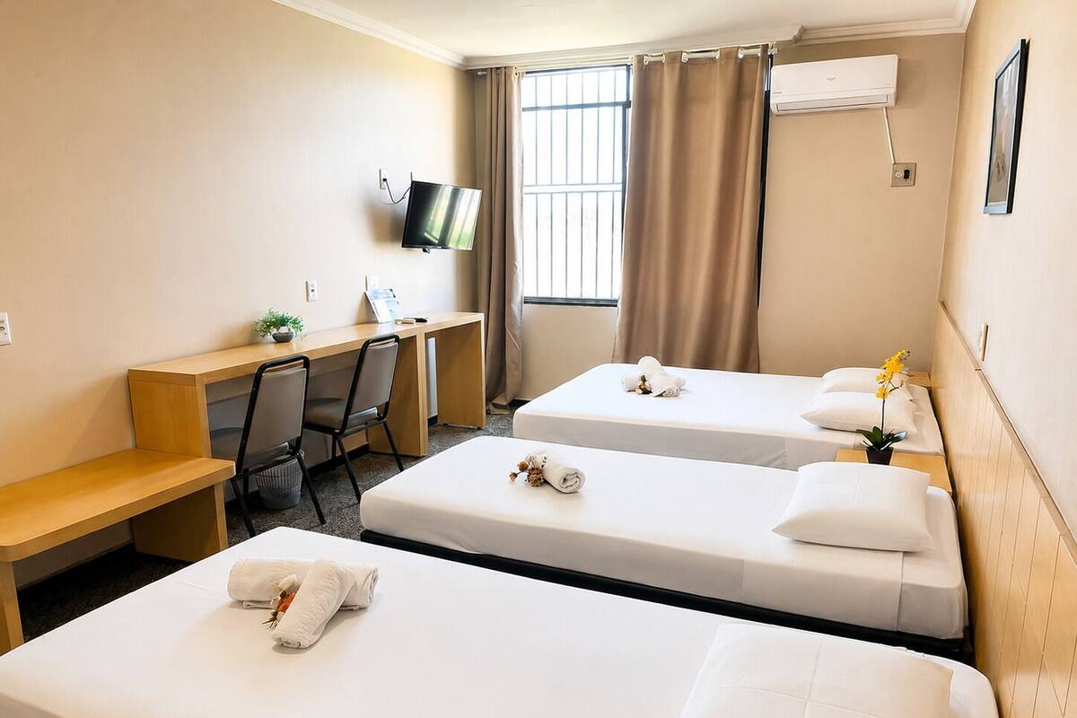 Deluxe Quadruple Room, 1 Bedroom, Accessible | Minibar, in-room safe, desk, laptop workspace