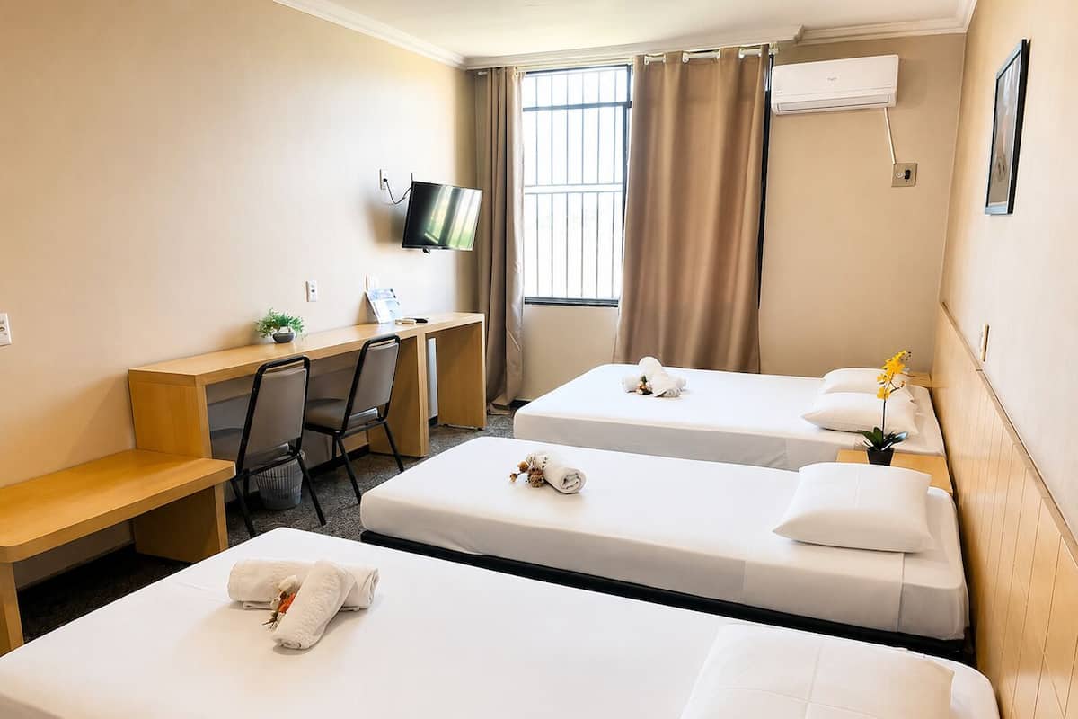 Deluxe Quadruple Room, 1 Bedroom, Accessible | Minibar, in-room safe, desk, laptop workspace