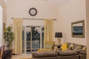 Luxury Condo, 1 King Bed, Non Smoking | Living area | Flat-screen TV