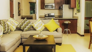 Luxury Condo, 1 King Bed, Non Smoking | Living area | Flat-screen TV - Baypoint Dunns River (Ocho Rios)