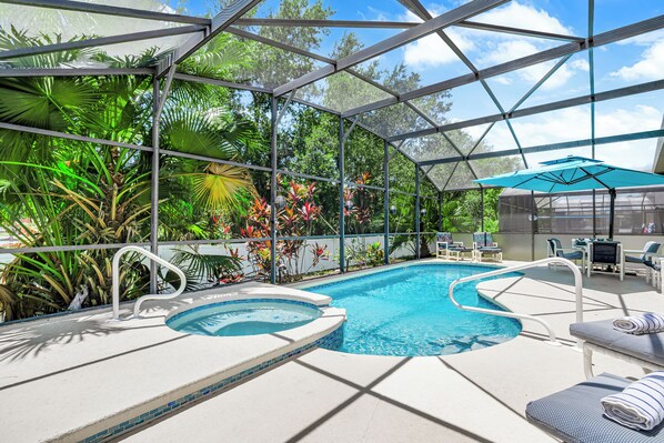 Outdoor pool, pool umbrellas, sun loungers