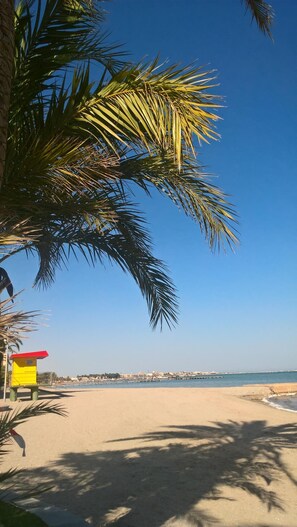 On the beach, beach towels