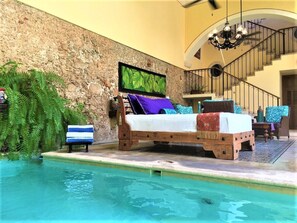 Daybed next to the pool...perfect for a midday siesta :-)