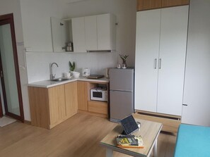 Business studio, balkon | Privékeuken | Een waterkoker