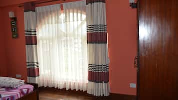 Deluxe Double Room, 1 Queen Bed, Non Smoking | Bathroom | Shower, slippers, towels