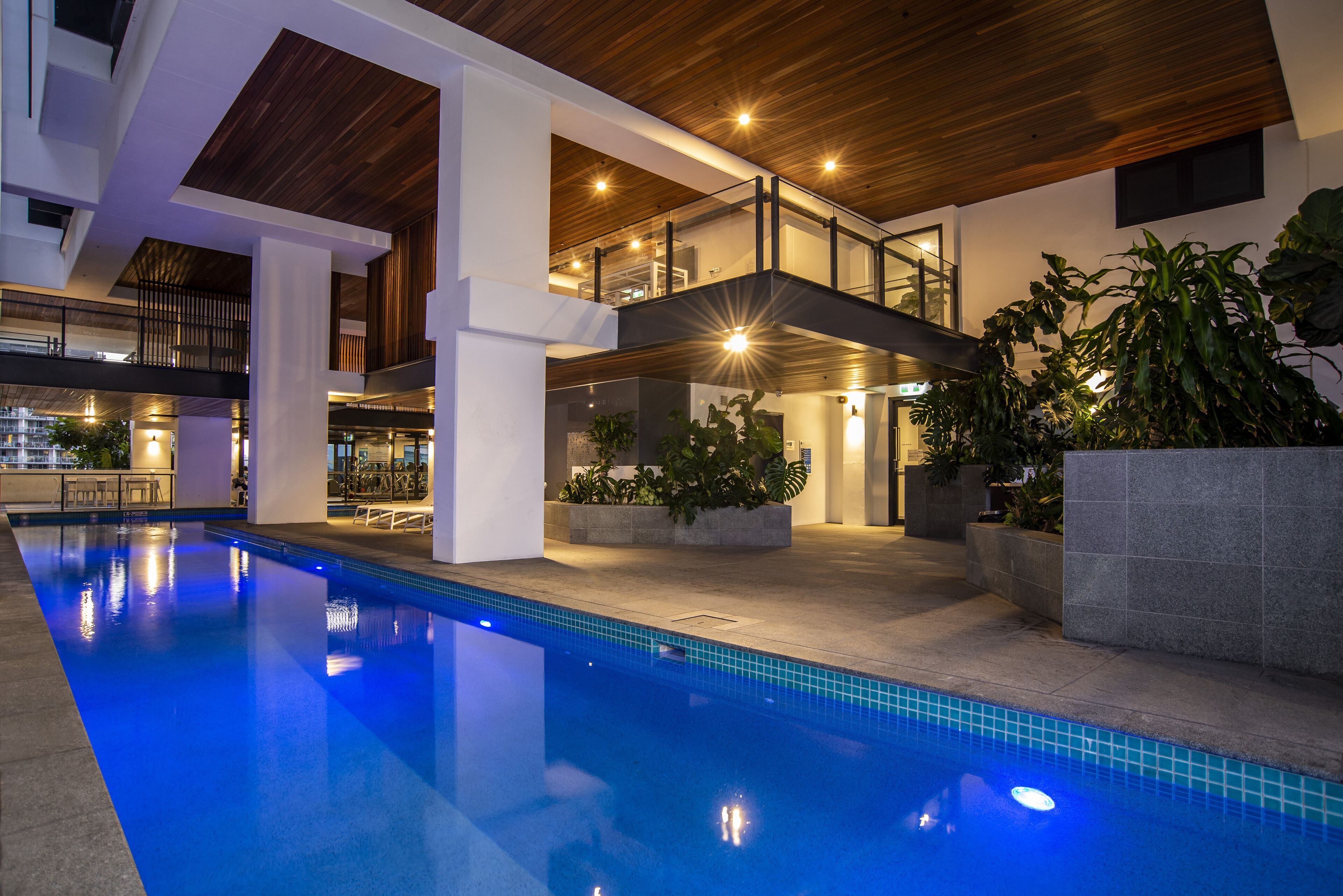 Outdoor pool, open 6 AM to 10 PM, pool loungers