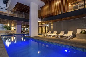 Outdoor pool, open 6 AM to 10 PM, sun loungers