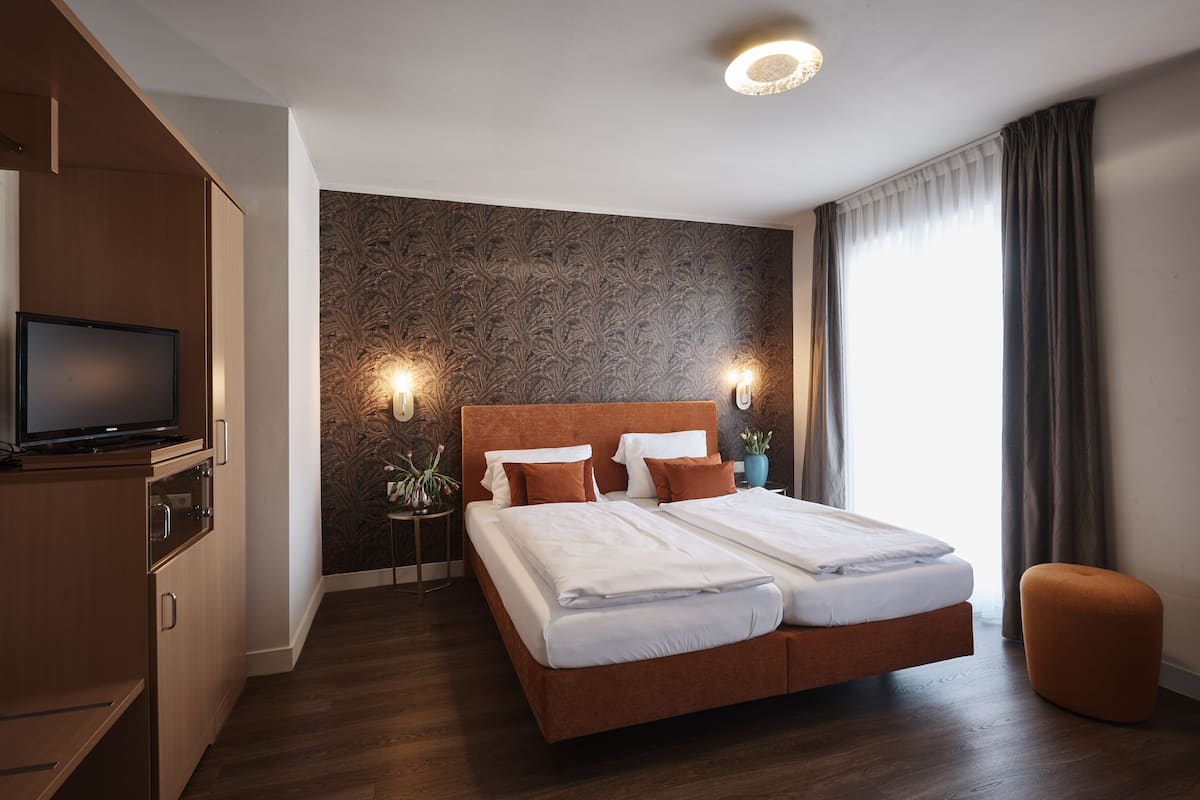 desk, blackout curtains, soundproofing, iron/ironing board