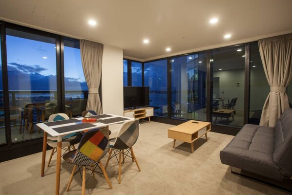 Design Apartment, 2 Bedrooms, City View | Living area | Flat-screen TV