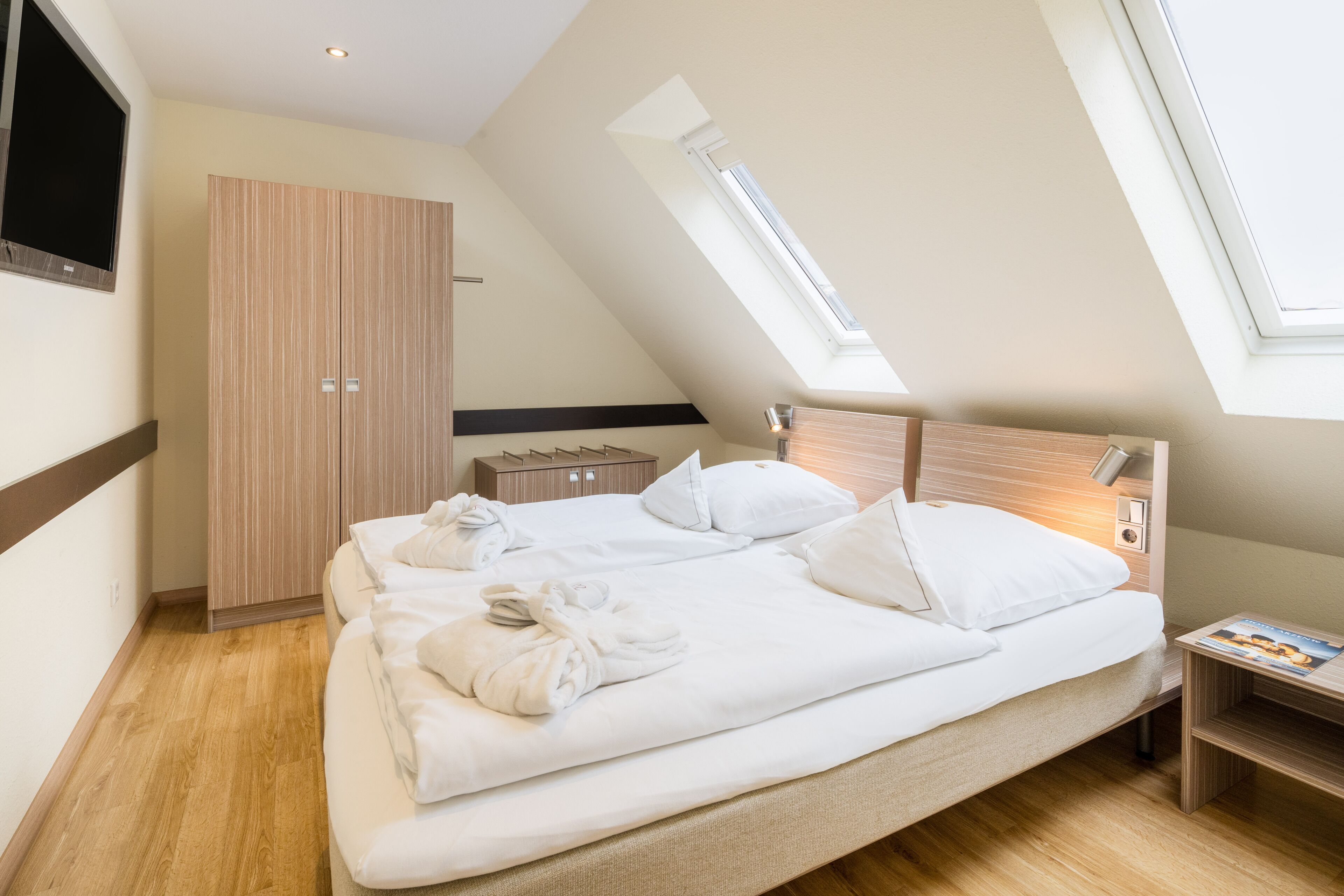 junior suite | in-room safe, desk, iron/ironing board, cots/infant beds