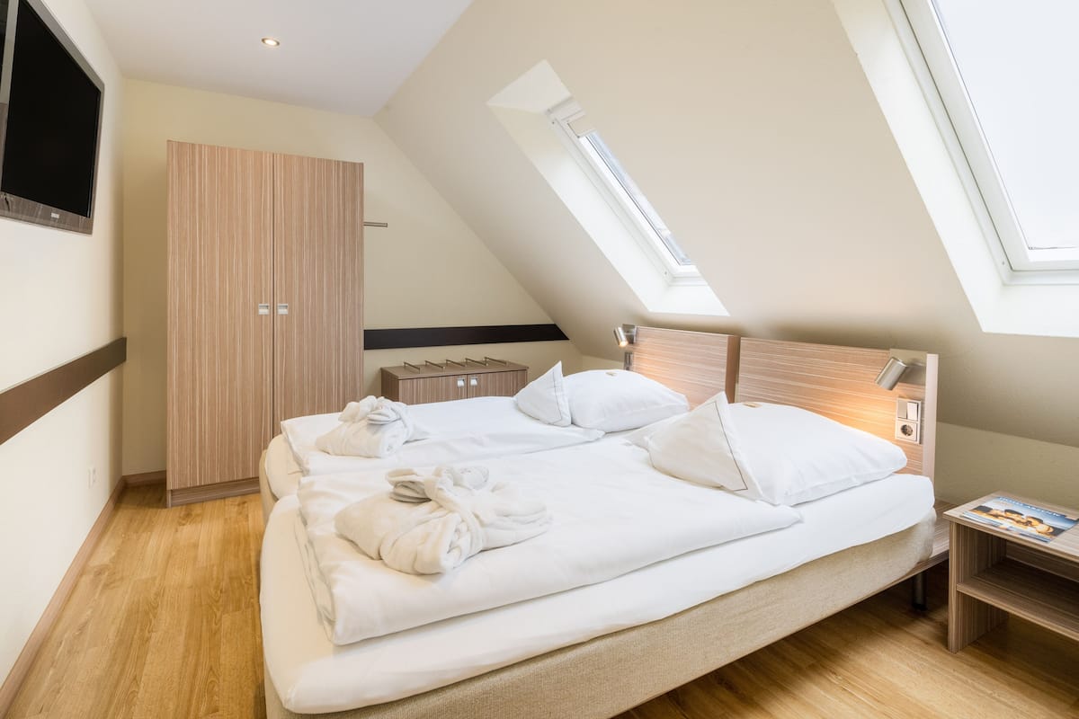 junior suite | in-room safe, desk, iron/ironing board, cots/infant beds