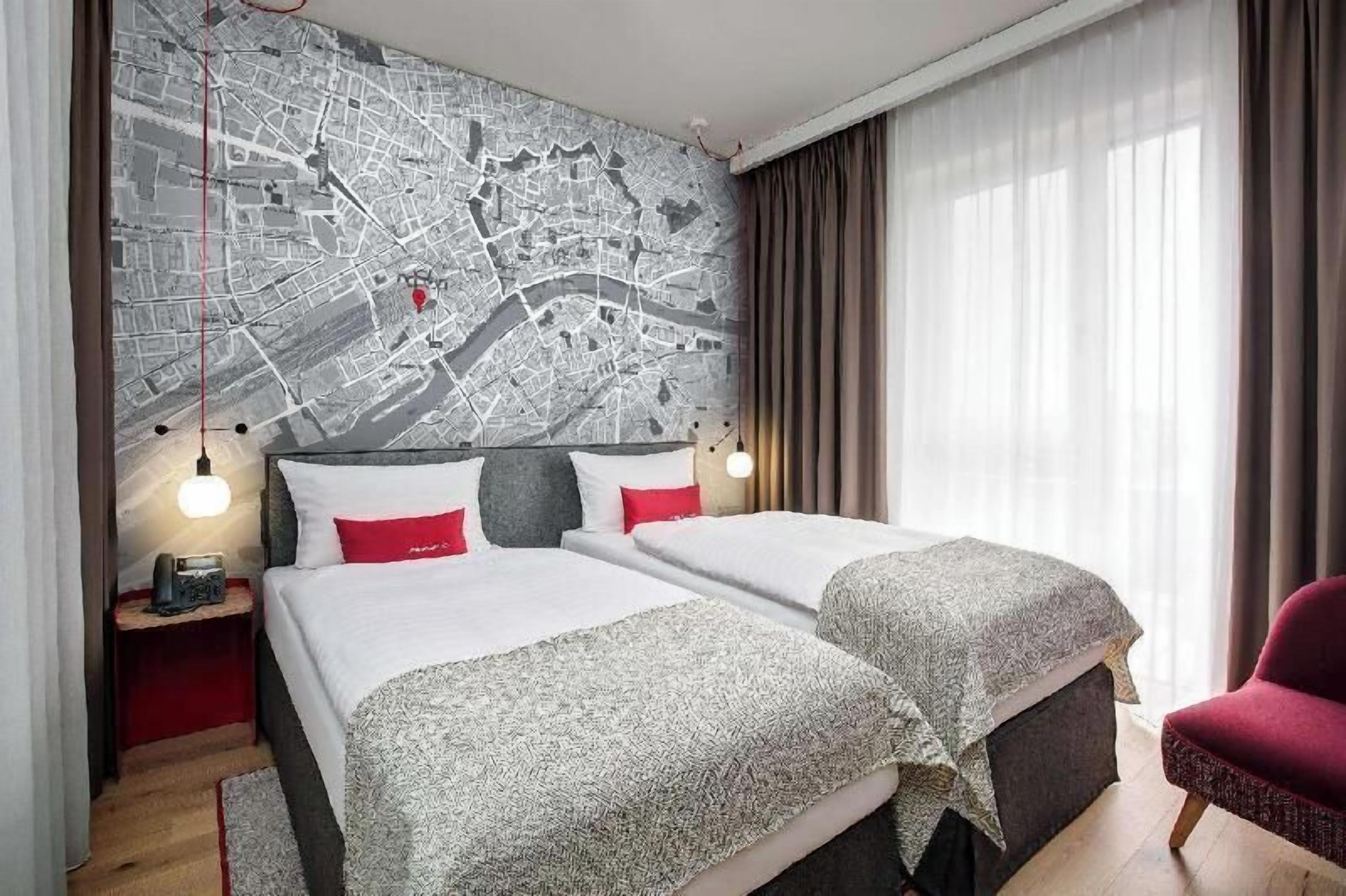 Hypo-allergenic bedding, down duvets, in-room safe, desk
