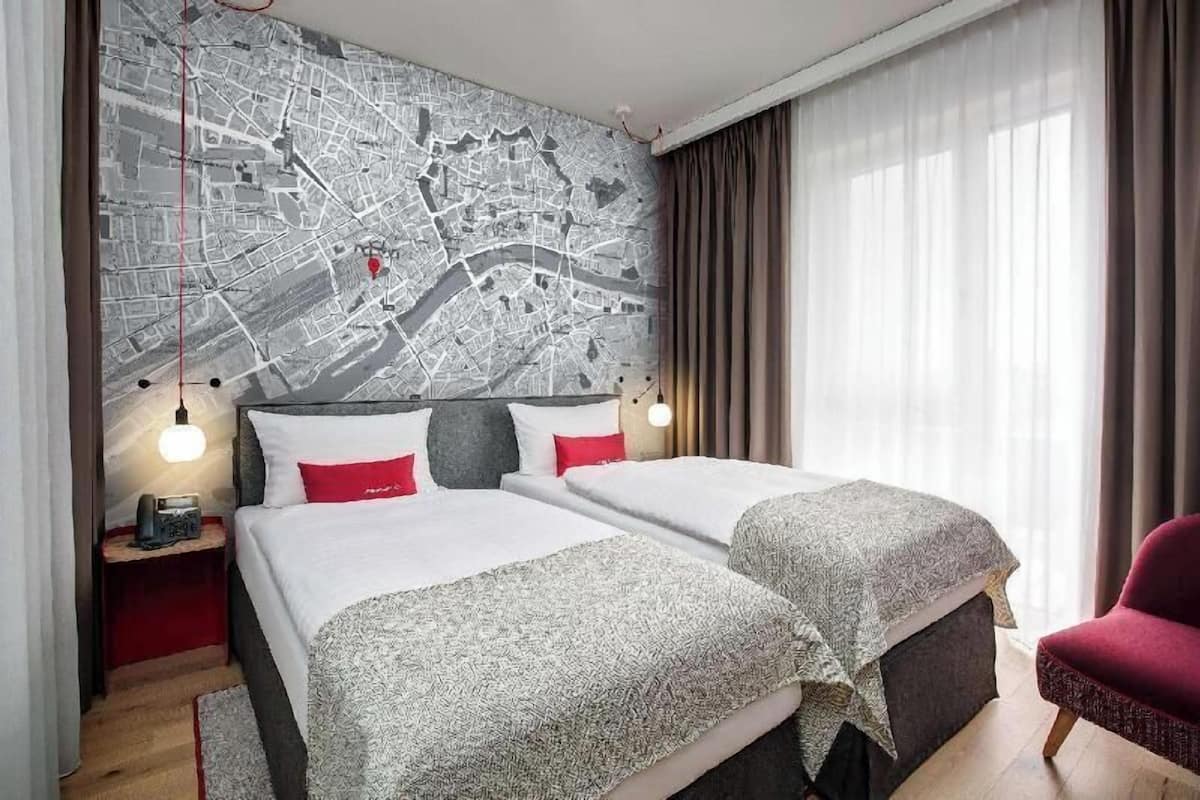 Hypo-allergenic bedding, down duvets, in-room safe, desk