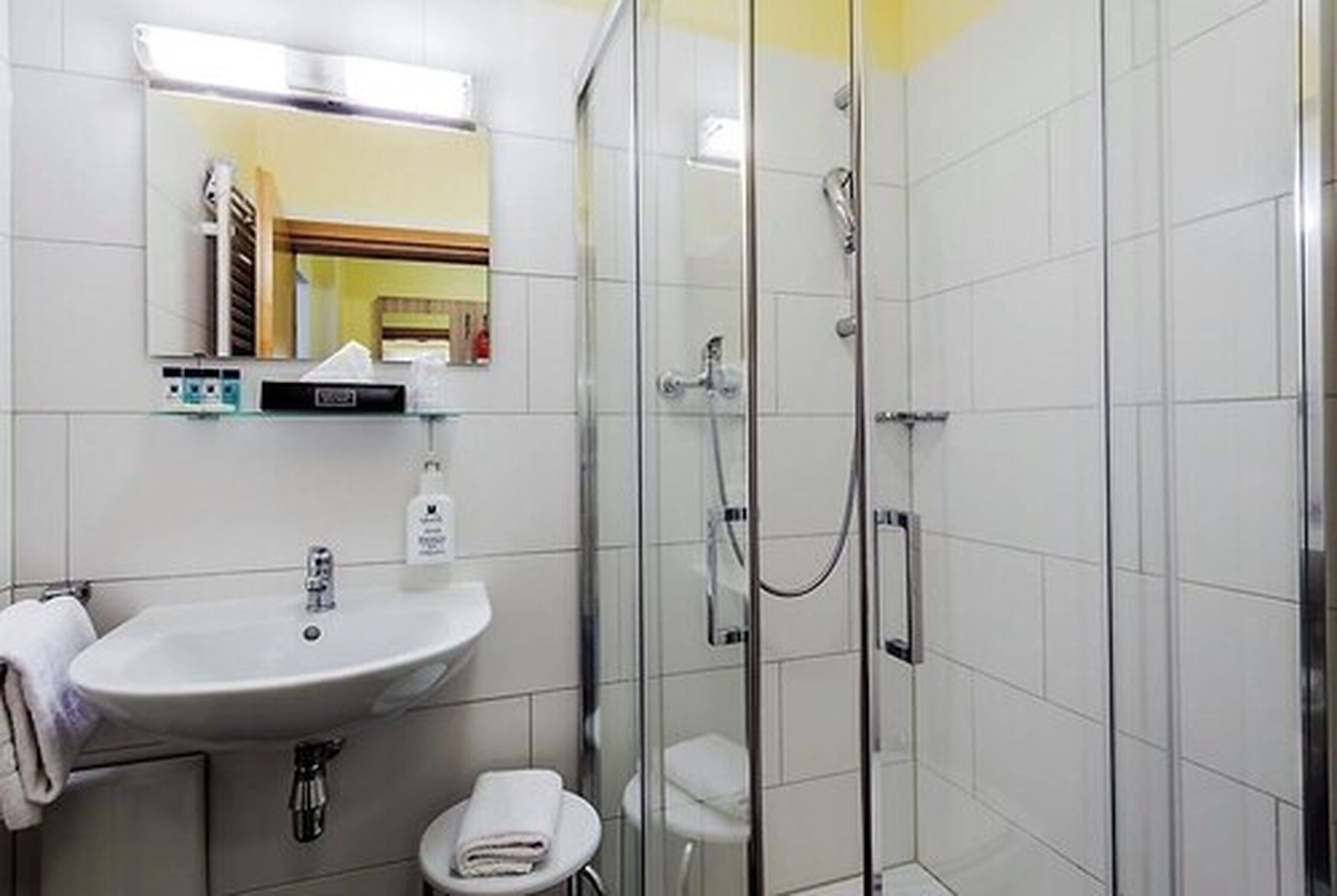 free toiletries, hair dryer, slippers, towels