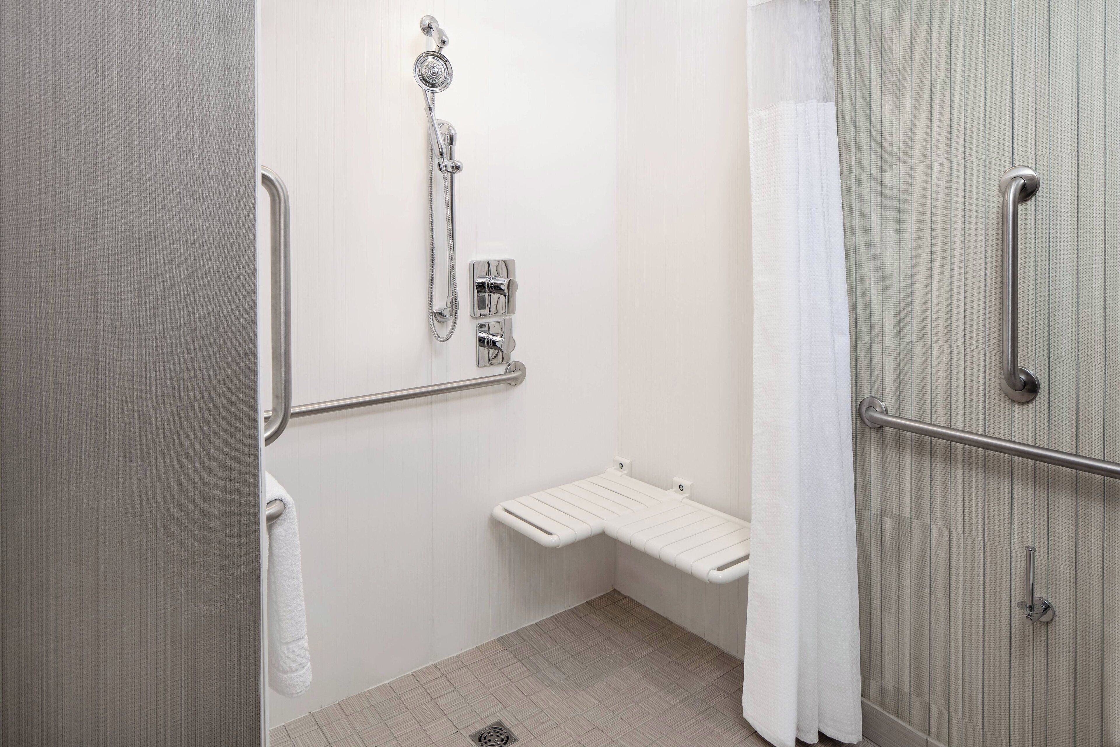 combined shower/bathtub, free toiletries, hair dryer, towels