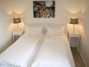 1 bedroom, travel crib, WiFi, bed sheets