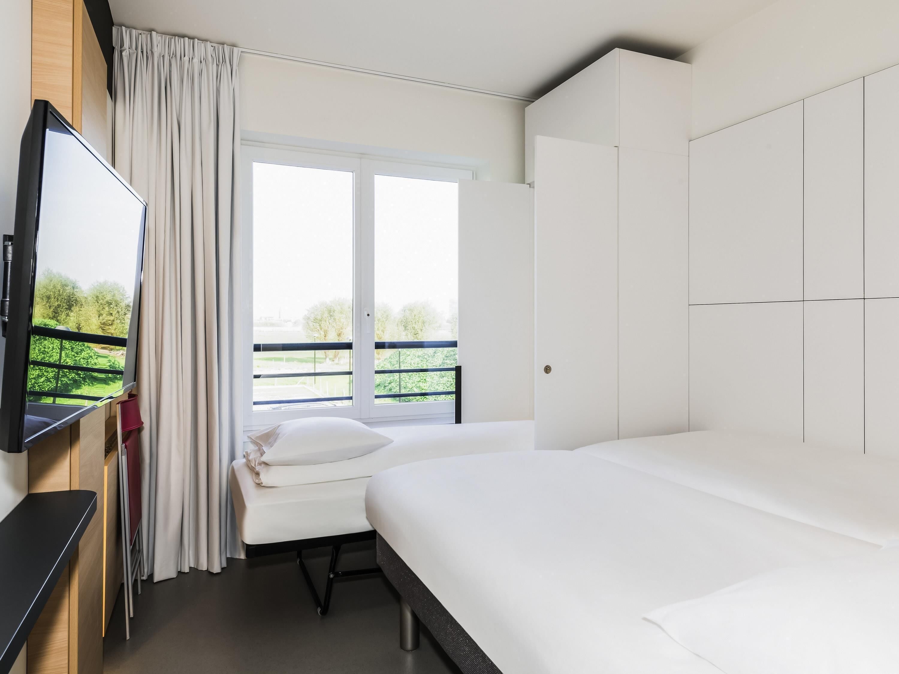 Habitación estándar, 3 camas individuales | Escritorio, cunas gratuitas, camas extra gratis y wifi gratis 