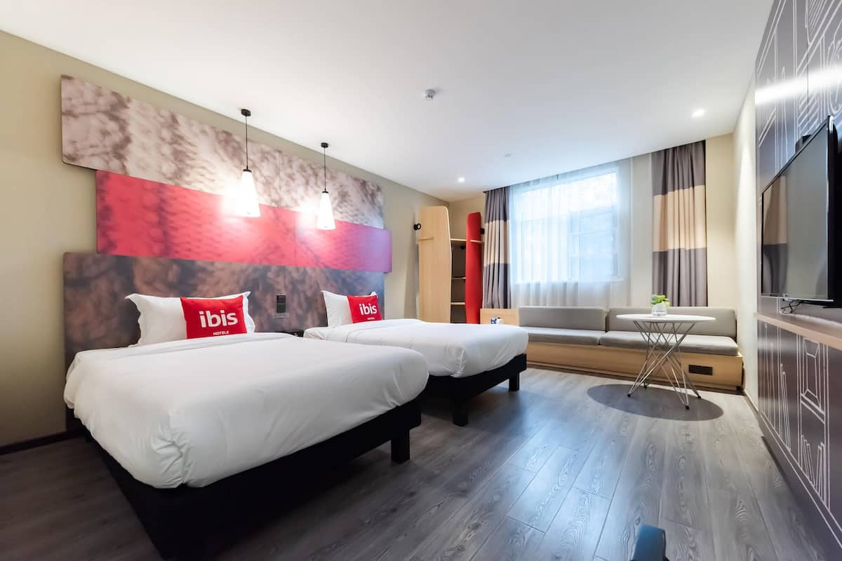 Twin Room | Desk, iron/ironing board (on request), WiFi (free), bed sheets