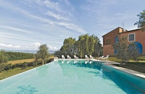 Outdoor pool, pool umbrellas, pool loungers