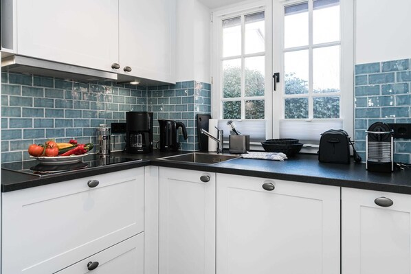Fridge, microwave, dishwasher, high chair