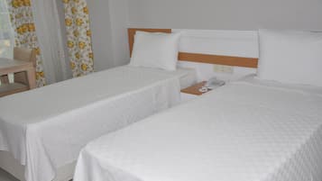Standard Twin Room, 2 Single Beds, Balcony | In-room safe, desk, free WiFi