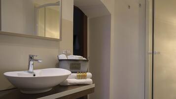 Shower, free toiletries, hair dryer, towels