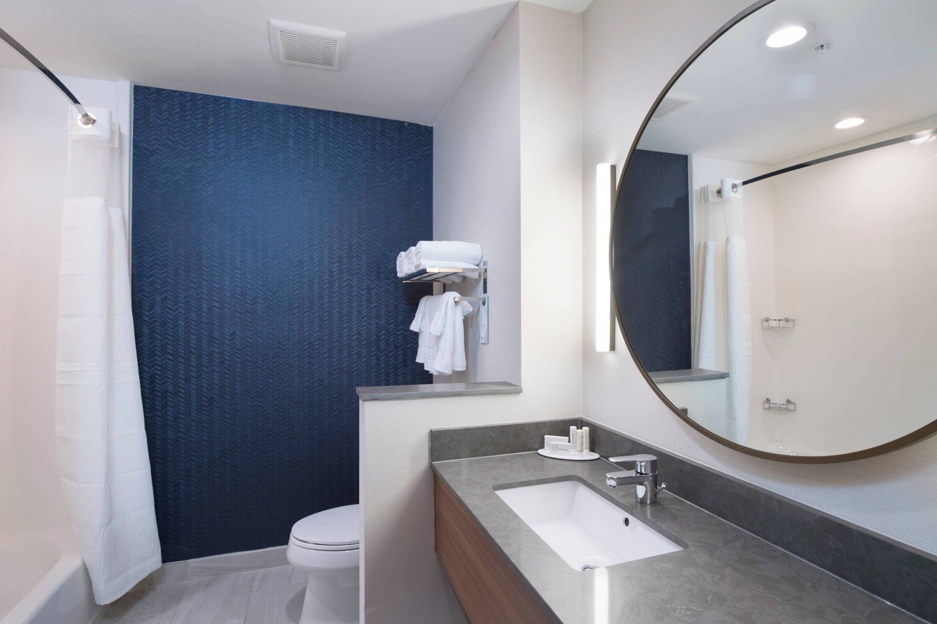 combined shower/bathtub, free toiletries, hair dryer, towels