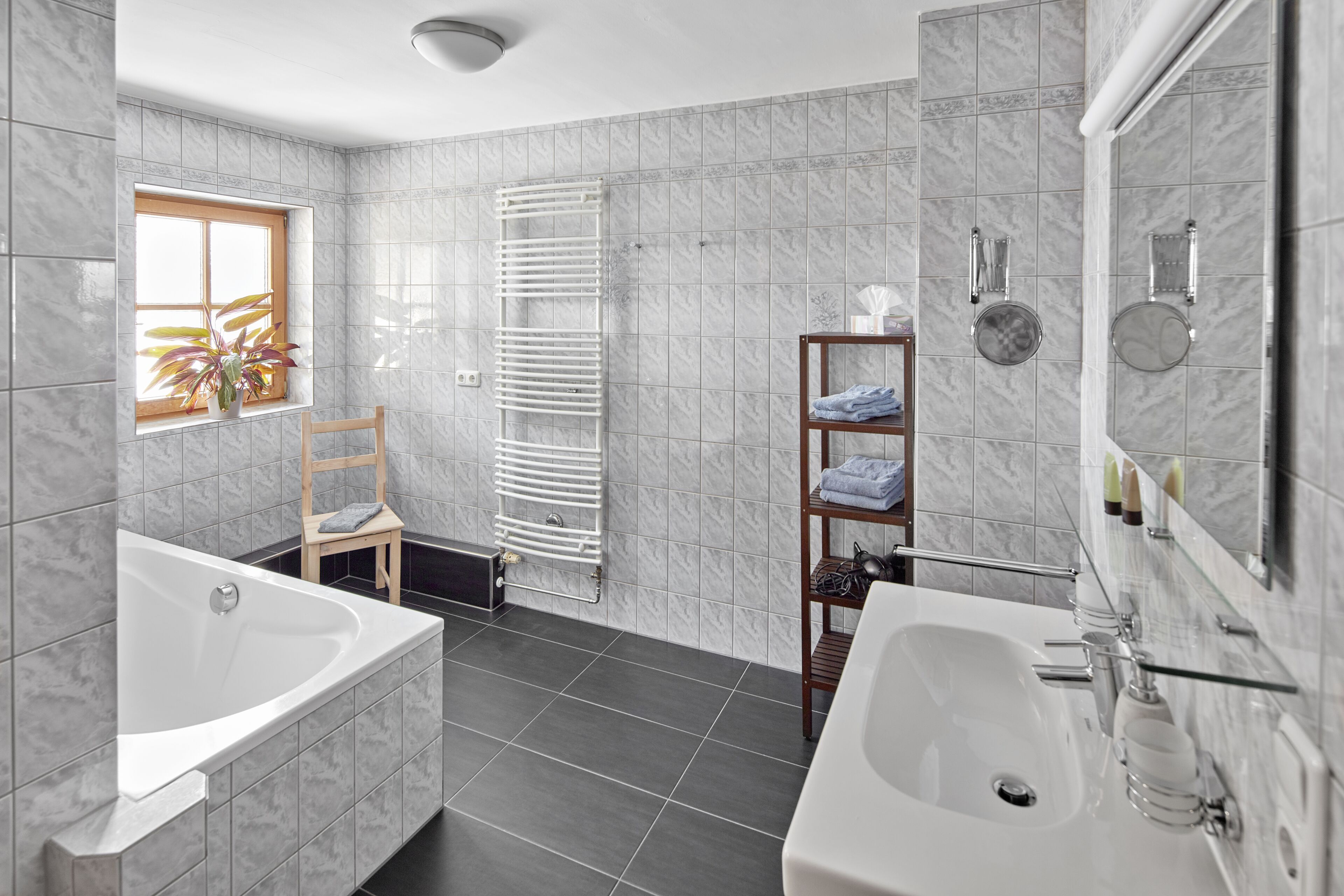 junior suite | bathroom | eco-friendly toiletries, hair dryer, bathrobes, slippers