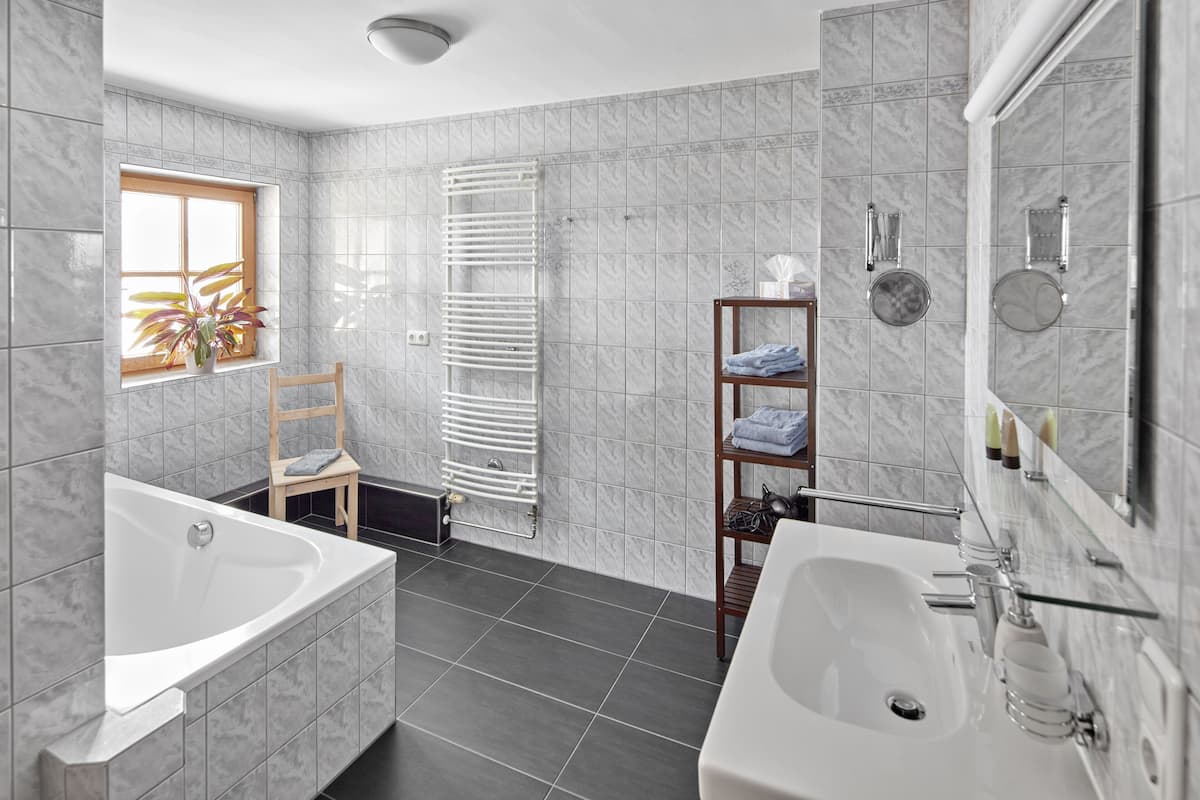 junior suite | bathroom | eco-friendly toiletries, hair dryer, bathrobes, slippers