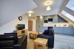 Apartment, 2 Bedrooms | Living area | Flat-screen TV