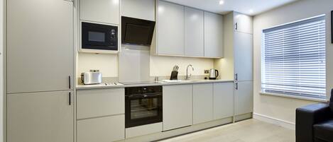 Lägenhet - 1 sovrum | Eget kök | Stort kylskåp, mikrovågsugn, ugn och spishäll