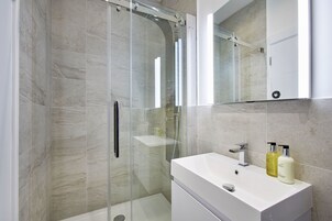 Shower, free toiletries, hair dryer, towels