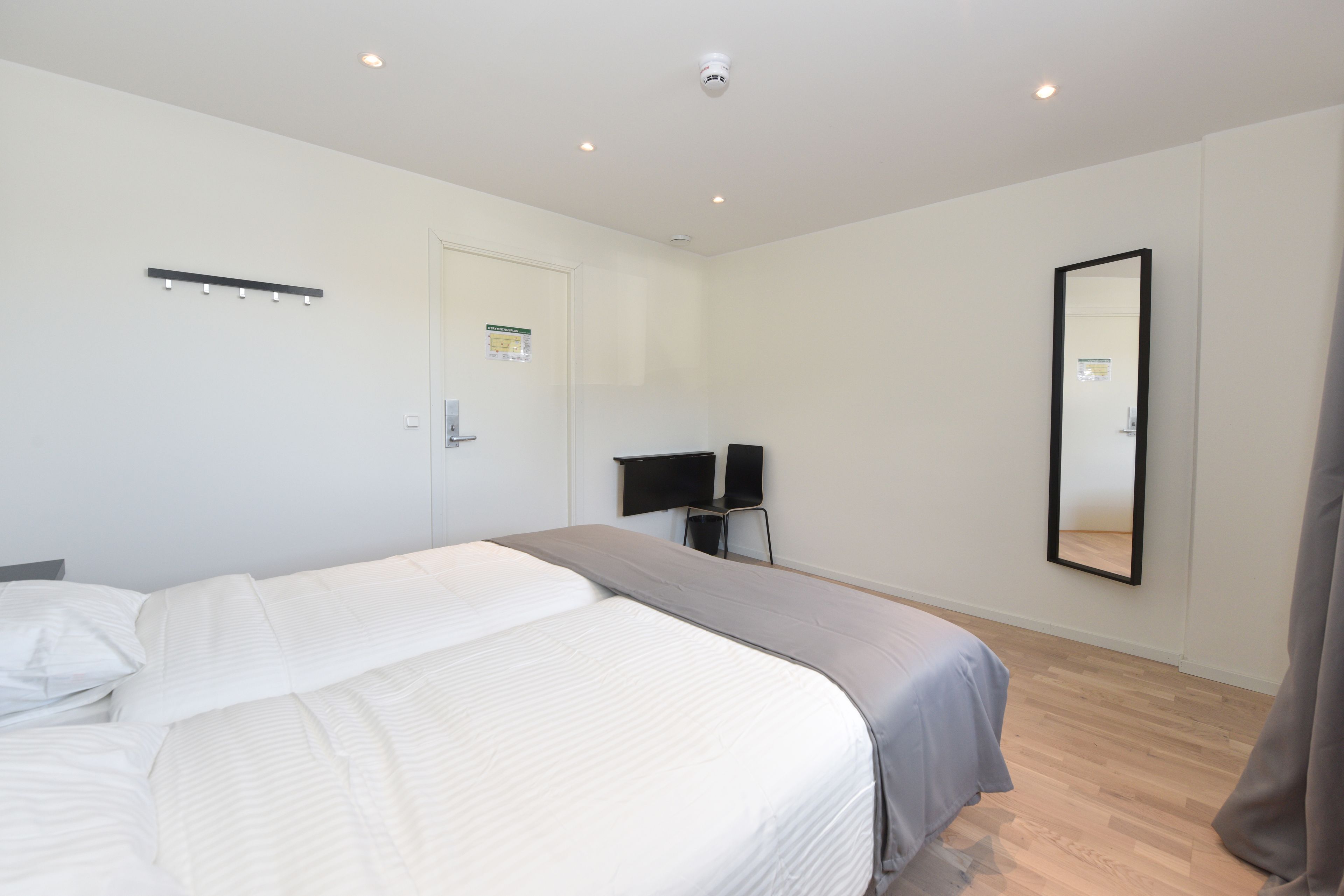 standard twin room, 2 single beds, shared bathroom | blackout curtains, soundproofing, free wifi, bed sheets