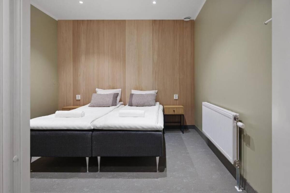 Standard Twin Room, 2 Twin Beds, Shared Bathroom (no window) | Blackout drapes, soundproofing, WiFi (free), bed sheets