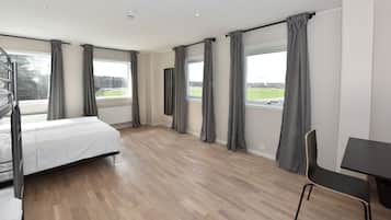 Basic Quadruple Room, Multiple Beds, Shared Bathroom | Blackout drapes, soundproofing, free WiFi, bed sheets