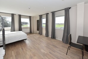 Basic Quadruple Room, Multiple Beds, Shared Bathroom | Blackout drapes, soundproofing, free WiFi, bed sheets - Måby Park Hotel Arlanda (Marsta)