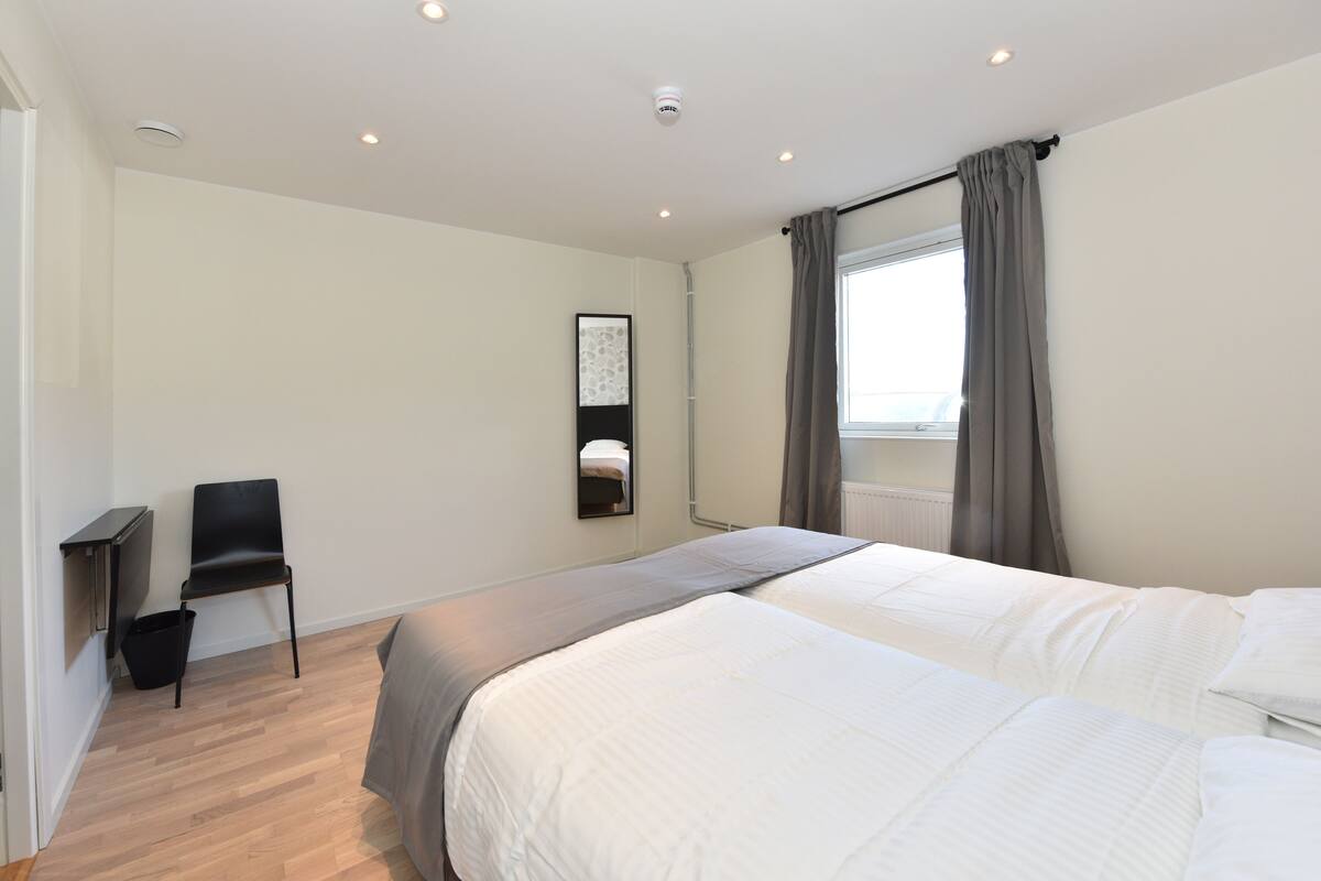 standard twin room, 2 single beds, shared bathroom | blackout curtains, soundproofing, free wifi, bed sheets
